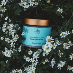 Naturally luxurious, fragrant and handmade skincare Gharam Body Sugar Scrub by House of Soap in flowers